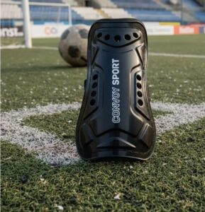 Caneleira Futebol Pequena Convoy Sport Elástico Anatômica EVA Preto e Azul